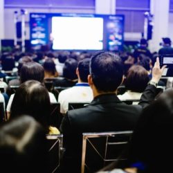 Employees listening to a presentation
